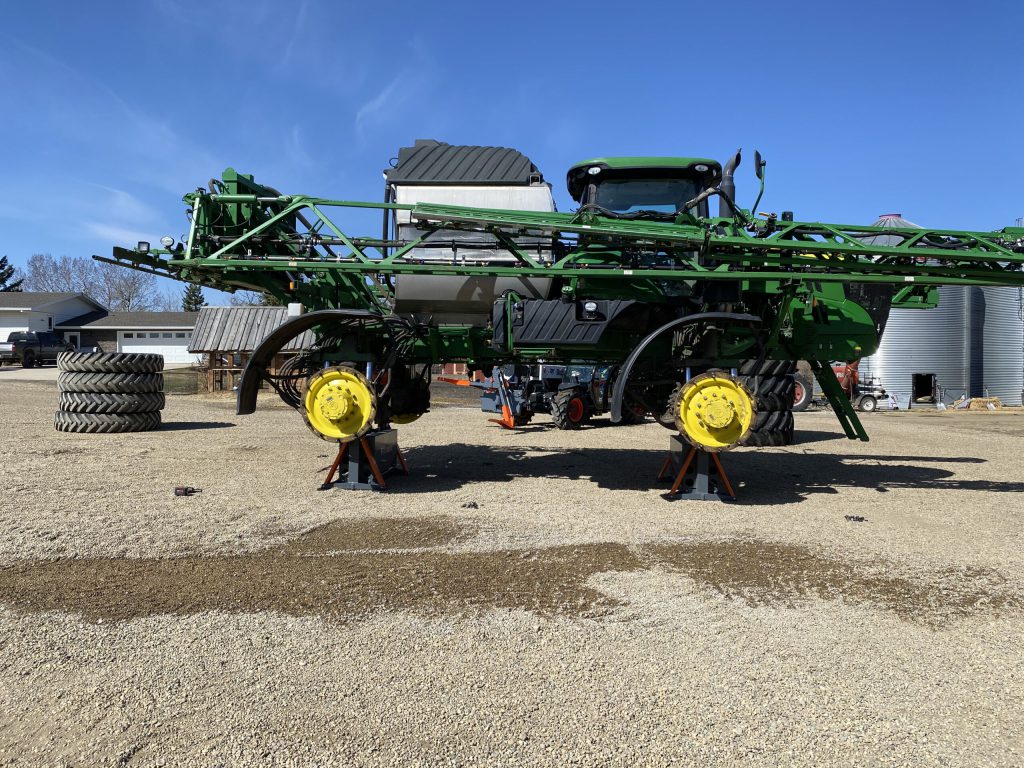 Farm equipment lifted with TG equipment jack